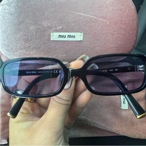 Miu Miu Black Sunglasses with Gold Detail